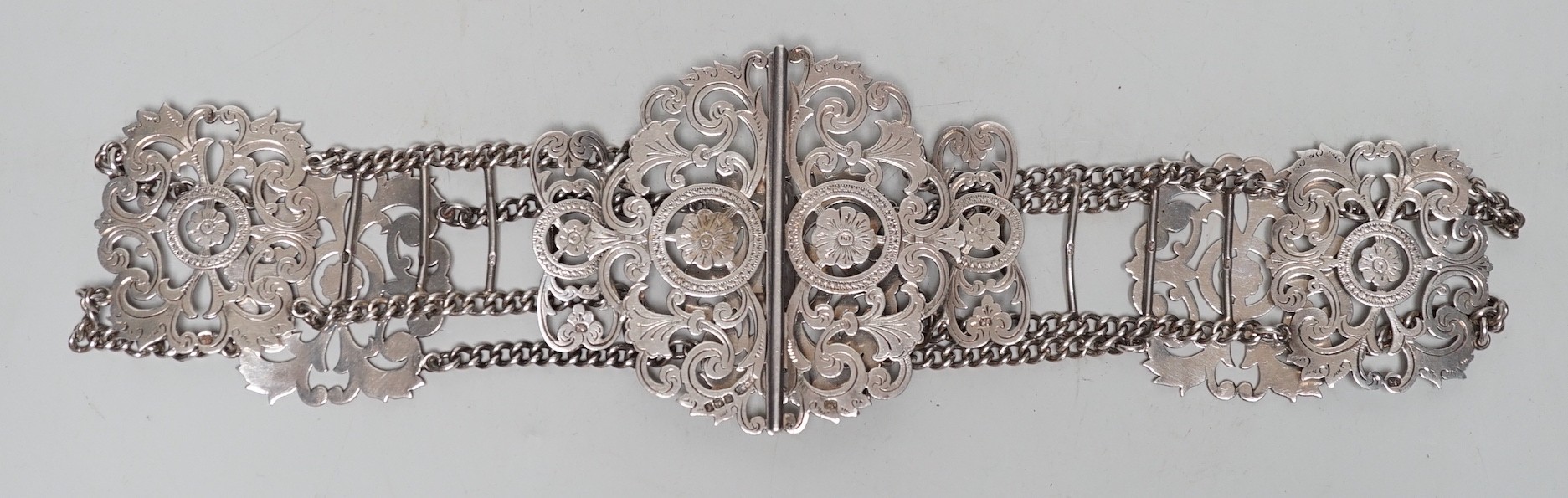 A late Victorian pierced silver belt, with chain links, James Dixon & Sons, Sheffield, 1898, overall 59.6cm.